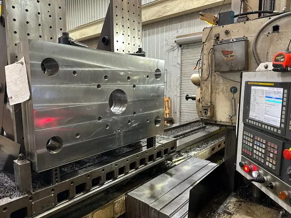 CNC boring mill machining a large steel plate component