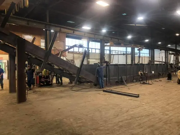 Conveyor structure fabrication inside the shop