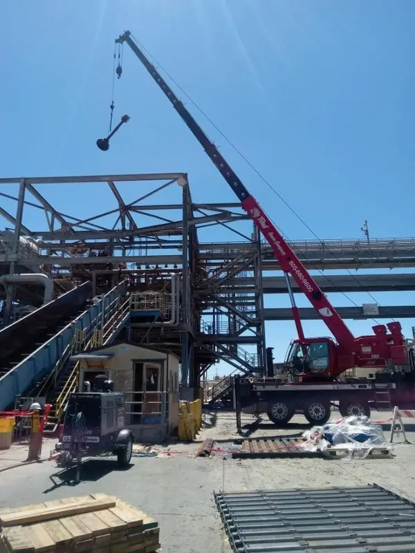 Crane supporting plant maintenance on structural steel