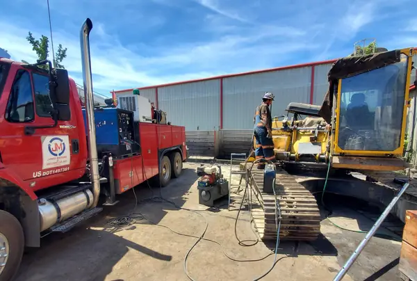 Field service repair on an excavator