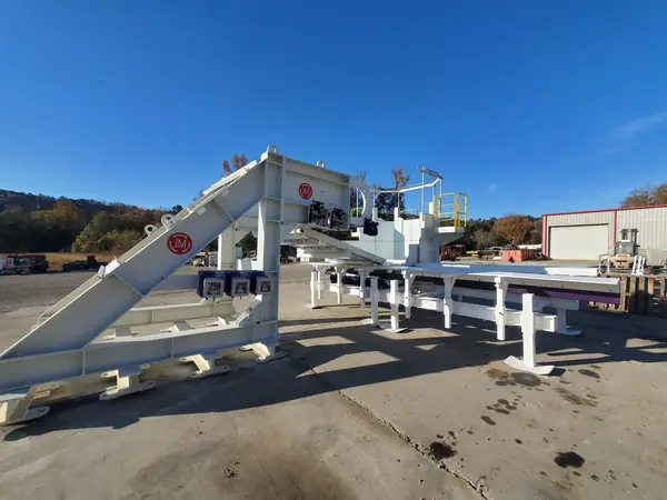 Fabricated conveyor truss sections staged in the shop yard