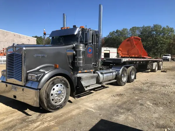 Jones truck delivering a rebuilt loader bucket