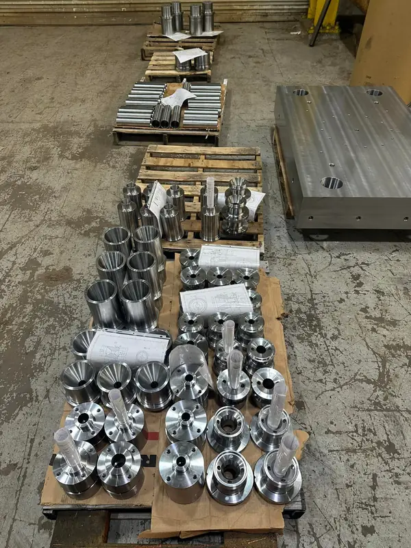 Production run of CNC machined parts on pallets