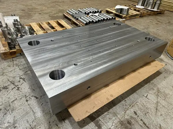 Precision machined steel plate