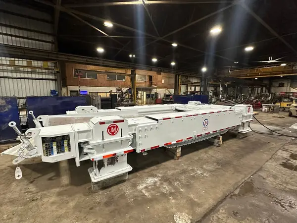 Fabricated mining equipment frame painted white