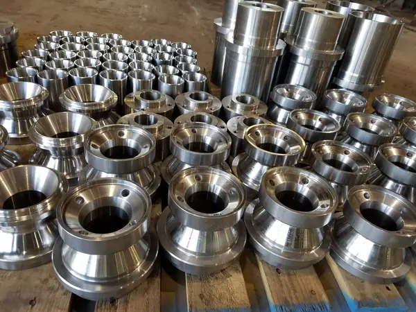 Batch of precision CNC machined steel wheels and bushings