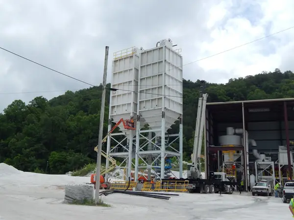 Silo and steel support tower at an aggregate site